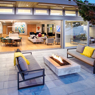Inspiration for a contemporary patio remodel in Orange County with no cover