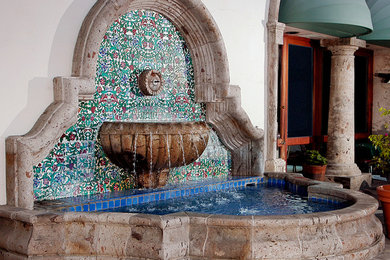 Cantera Stone Wall Fountain with Hand Painted Tile