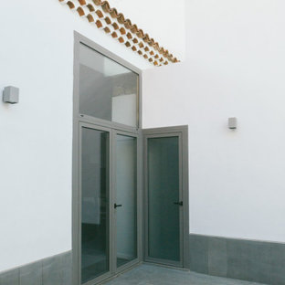 Ispirazione per un patio o portico stile rurale
