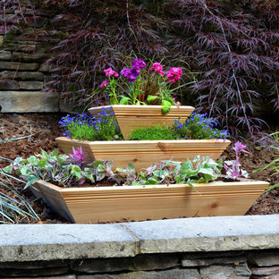 Patio vegetable garden - mid-sized traditional backyard patio vegetable garden idea in Other with decking and no cover
