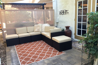 Patio - transitional patio idea in Other