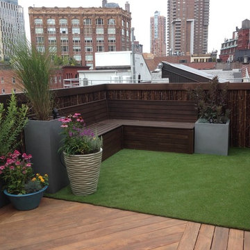 cedar bench with artificial turf and planters