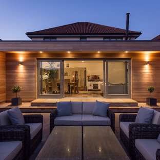 Ispirazione per un grande patio o portico design dietro casa con nessuna copertura