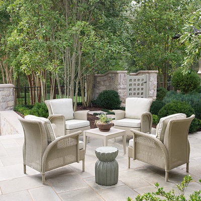 Inspiration for a timeless backyard stone patio remodel in Charlotte with no cover