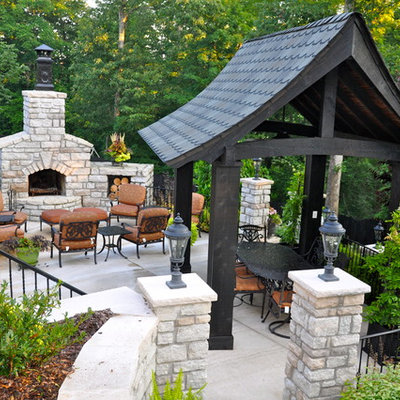 Patio - traditional patio idea in Cincinnati with a fire pit and a gazebo