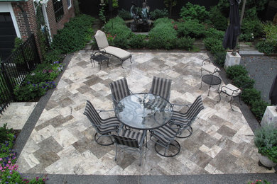 Patio - mid-sized stone patio idea in Providence