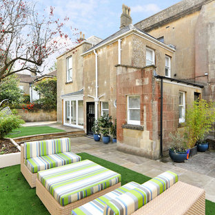 Design ideas for a large contemporary side patio in Other with concrete paving and no cover.