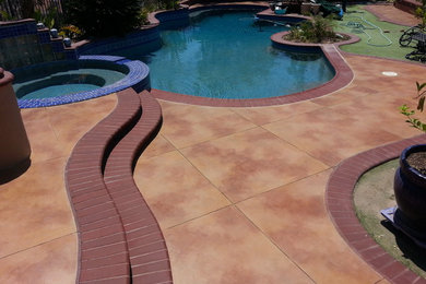 Photo of a mediterranean swimming pool in Orange County.