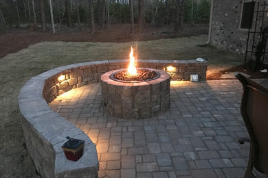 Example of a mid-sized transitional patio design in Charlotte