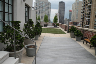 This is an example of a contemporary patio in New York.