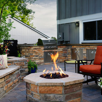 Stunning Patio with Fire Pit and Grill Island