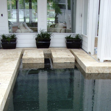 Coral Stone Deck and Black Glass Pool