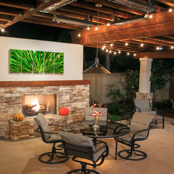 Cozy Outdoor Fireplace with Dining Area