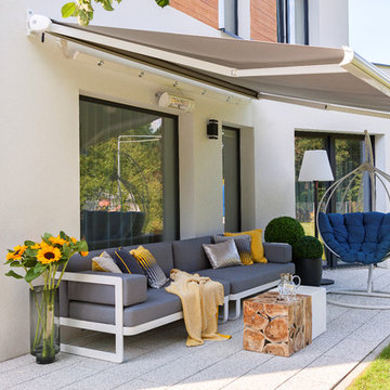 Create an outdoor oasis and keep cool with a motorized awning