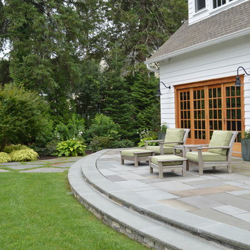 Curved radius cut bluestone patio and step and Goshen stone steppers.