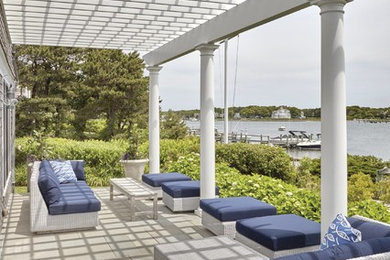 Design ideas for a patio in Boston with a pergola.