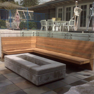Custom contemporary fire pit and built in bench