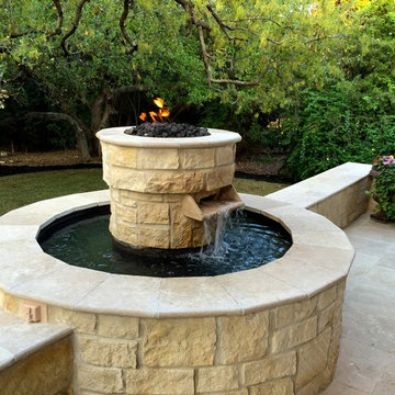 Custom Covered patio with fire/ water feature & outdoor kitchen