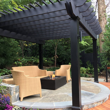 Custom Ebony Cedar Pergola on Stone Patio