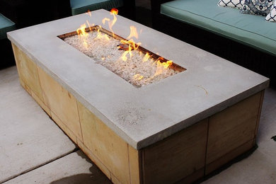 Patio - mid-sized transitional backyard concrete paver patio idea in Boise with a fire pit and no cover