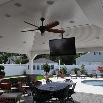 Custom Freeform Pool with Sunshelf and Outdoor Kitchen
