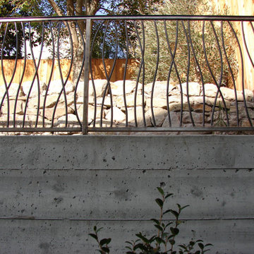 Custom Iron Hand Railing on Concrete Retaining Wall