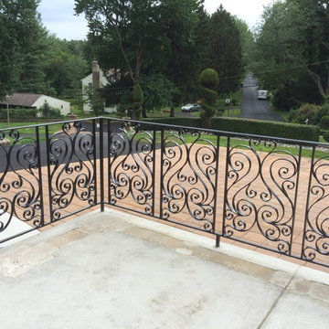 Custom Made Wrought Iron Exterior Step Rail and Patio Enclosure