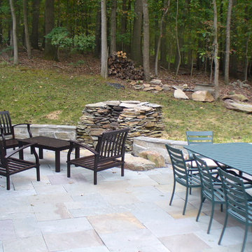 Custom Patio blends natural environment and existing fire pit