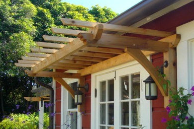 Inspiration for a mid-sized mediterranean backyard patio remodel in San Luis Obispo with a pergola