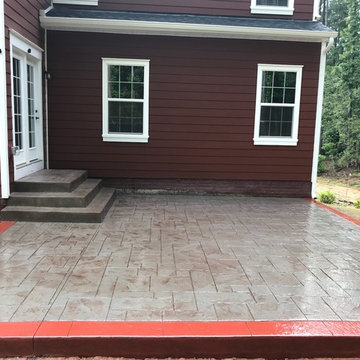 D-Stamped concrete patio with a red border