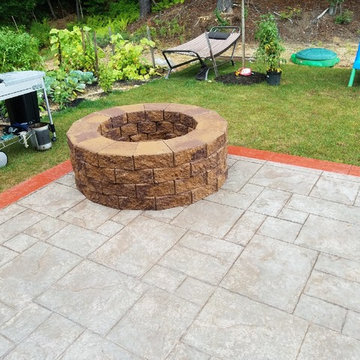 D-Stamped concrete patio with a red border
