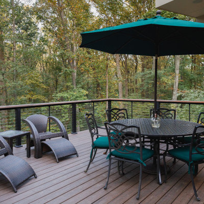 Mid-sized elegant backyard patio photo in Baltimore with decking and no cover