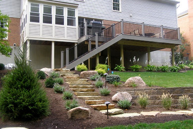 Example of a mountain style backyard patio design in Cincinnati
