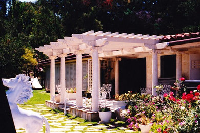 Inspiration for a medium sized classic back patio in San Francisco with a pergola.