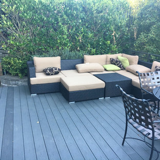 Ispirazione per un grande patio o portico contemporaneo dietro casa con nessuna copertura e pedane