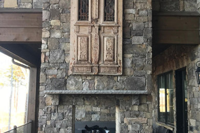 Decor - Antique Doors above outdoor fireplace