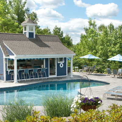 Inspiration for a large timeless backyard stone patio remodel in Manchester with a gazebo