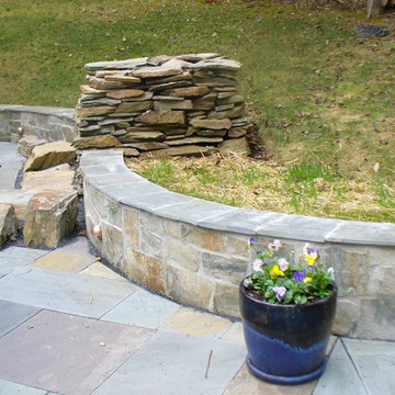 Detail of custom wall and fire, lighting and fire pit