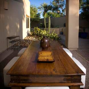 Esempio di un patio o portico etnico