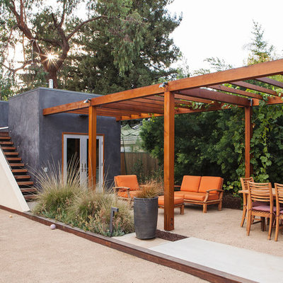 Inspiration for a contemporary decomposed granite patio remodel in San Francisco with a pergola