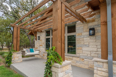 Example of a mountain style patio design in Austin