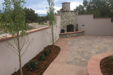 Example of a huge southwest patio design in Denver