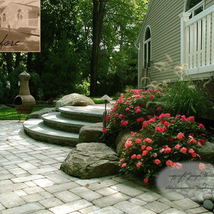 Esempio di un patio o portico boho chic