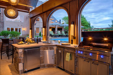 Contemporary patio in Los Angeles with an outdoor kitchen.