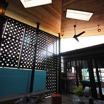 Enclosed exterior patio with fireplace