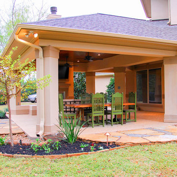 Extended Covered Patio with Fireplace and Dining Room