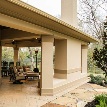 Extended Covered Patio with Fireplace and Dining Room