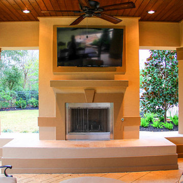 Extended Covered Patio with Fireplace and Dining Room