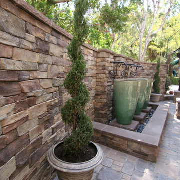 EXTERIOR BBQ, FOUNTAIN AND PATIO