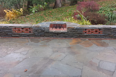 Falmouth, ME, Bluestone patio with Stone and Brick Firepit